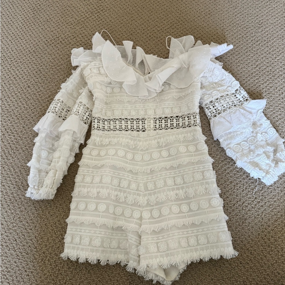 Alexis white romper XS never worn